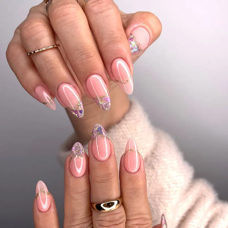 Pink almond nails with accents