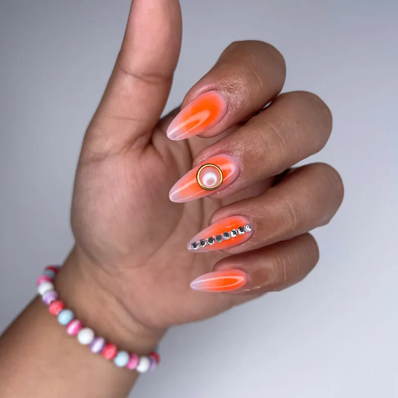 Neon orange nail art