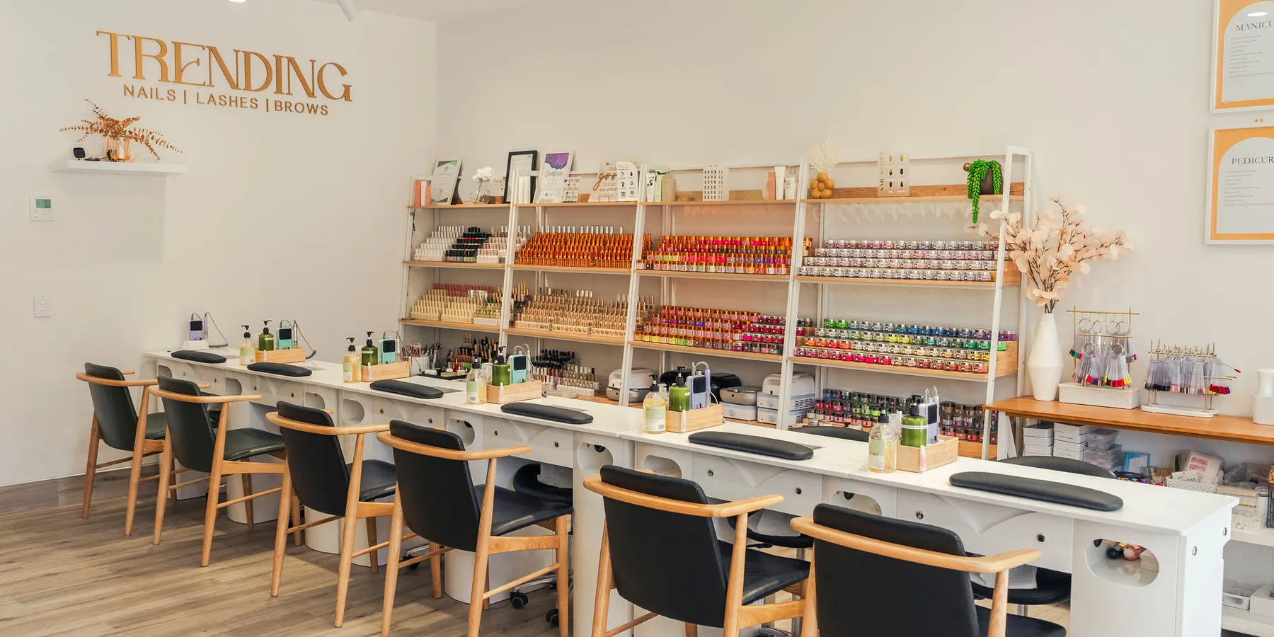 Inside the salon: manicure stations and the polish wall