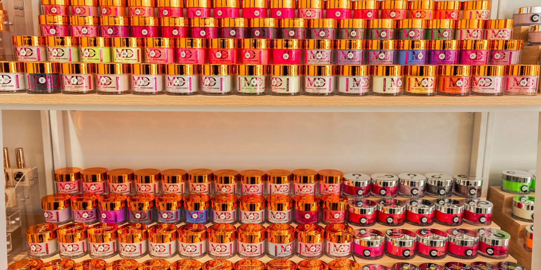 A wall of gel polish colours