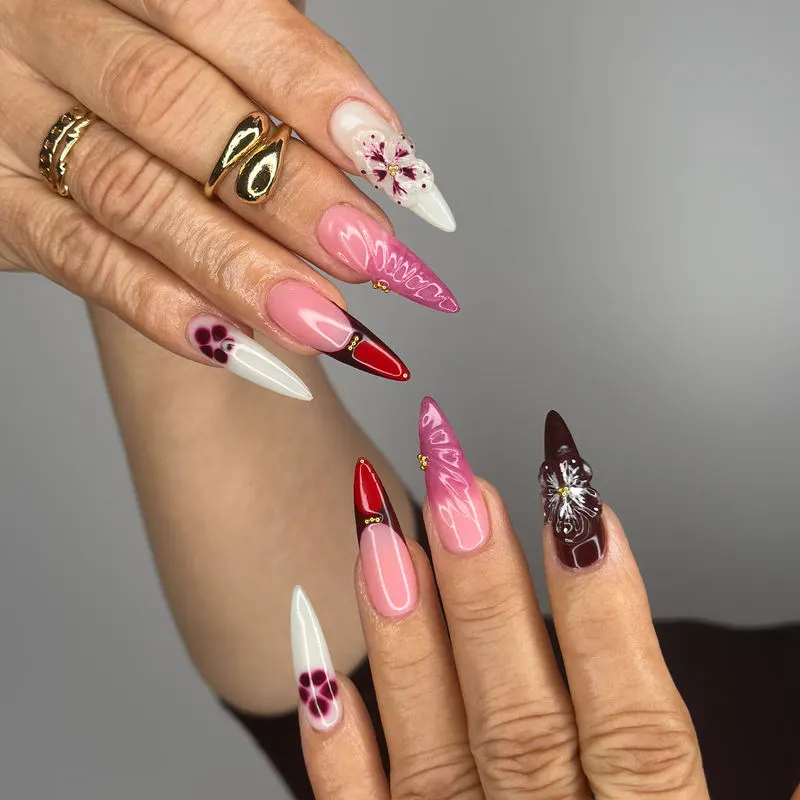Burgundy and pink nail art with hearts